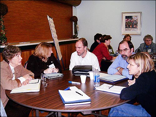 photo of Janet Shively, Starr Pettipas, Allan Quigley (St.FX), Rob MacLellan, Teresa Francis discussing project